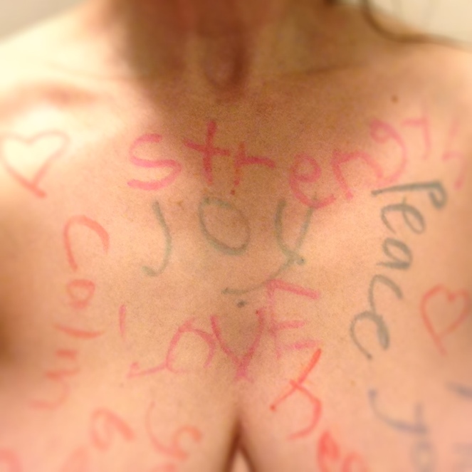 woman's chest with healing words