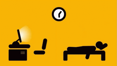 Image description: a GIF of a stick person who is rapidly alternating between lying on their bed and jumping ​up to sit at their computer and work while an analog clock spins rapidly on the wall above.
