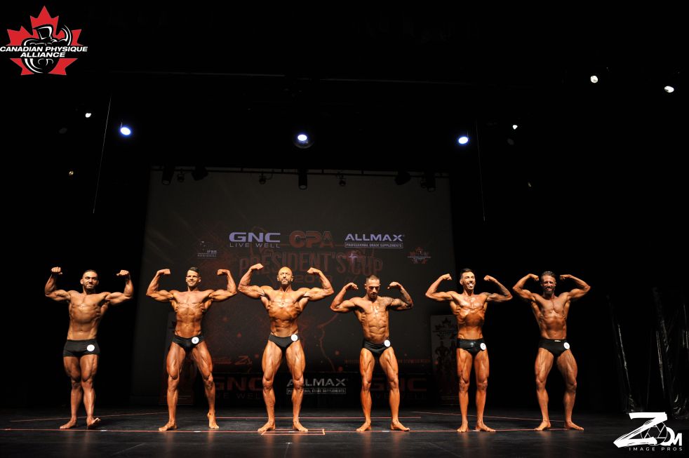 Five men posing at the Canadian Physique Alliance competition, 2019