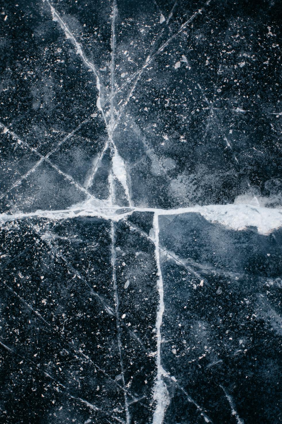 Cracked ice on a frozen lake.