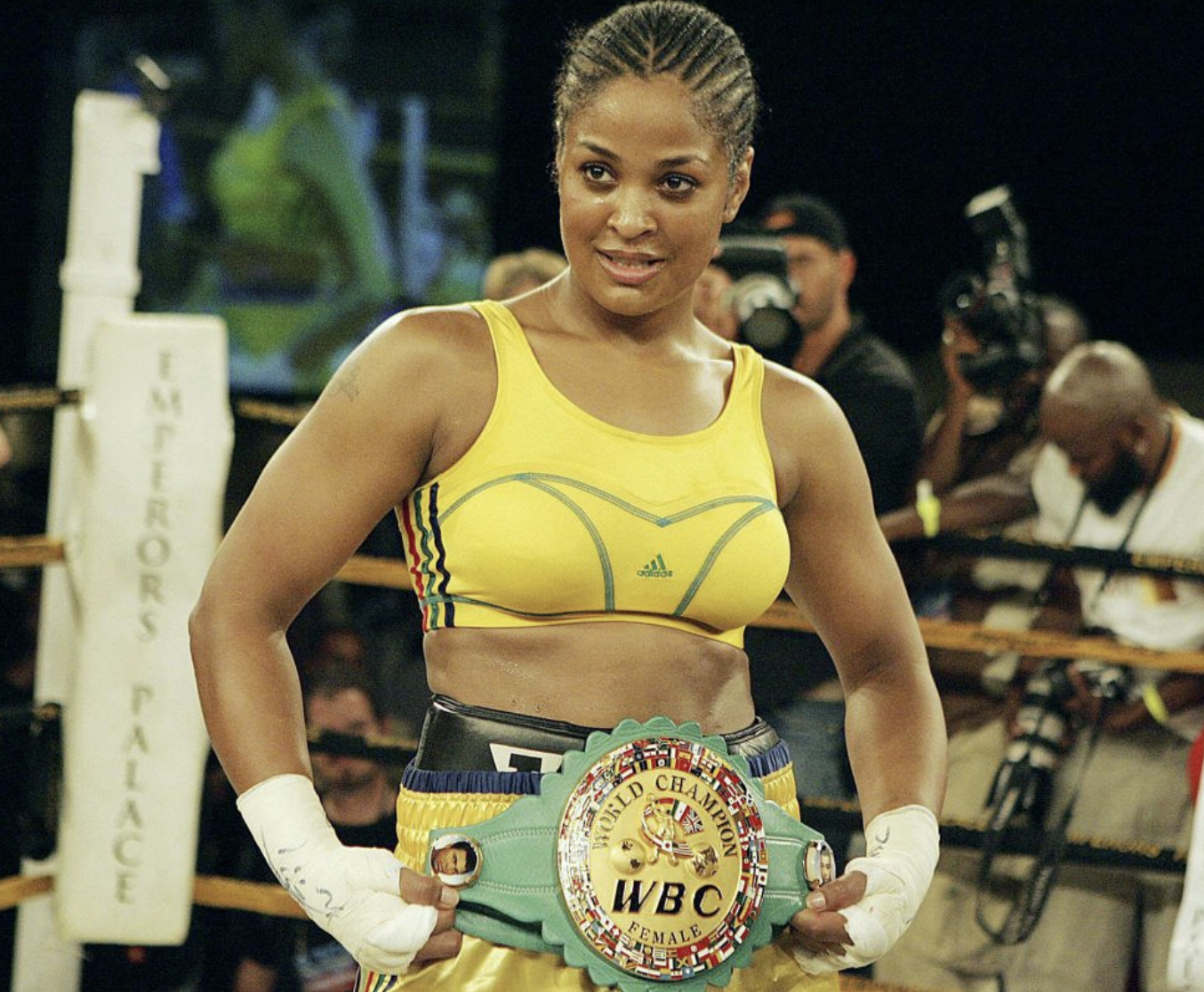 Laila Ali, holding her WBC/WIBA Super MIddleweight World Title belt.